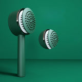 Brosse à cheveux autonettoyante